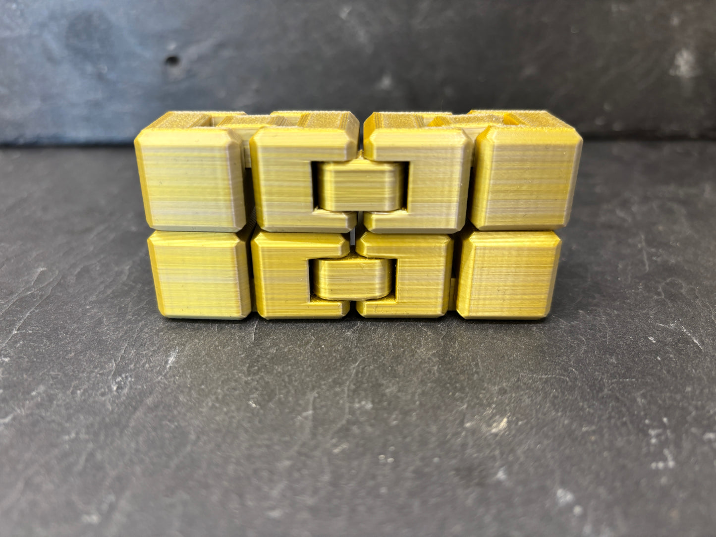 Infinity Fidget Terning Sølv/Guld