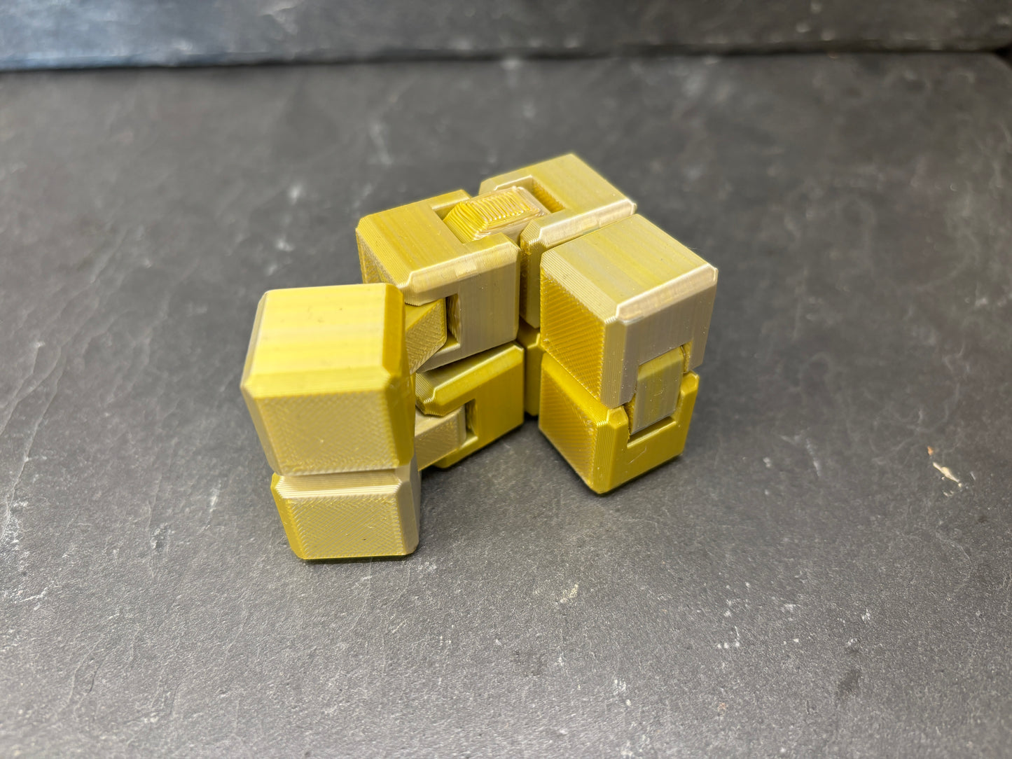 Infinity Fidget Terning Sølv/Guld