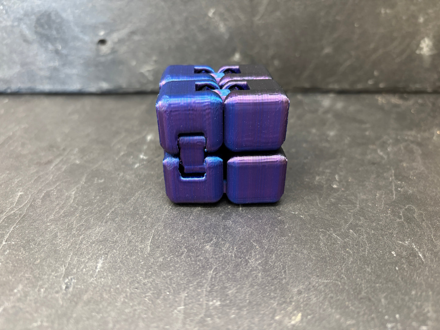 Infinity Fidget Terning Blå/Lilla/Sort